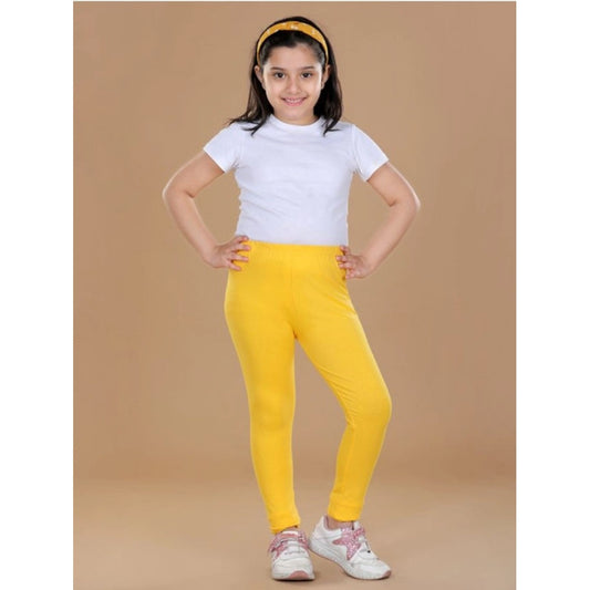 Girls Yellow Solid Cotton Lycra Elasticated Leggings