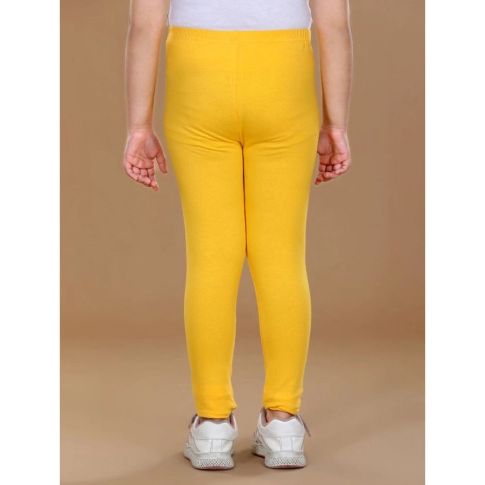 Girls Yellow Solid Cotton Lycra Elasticated Leggings